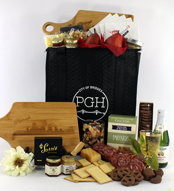 welcome to pittsburgh gifts in tote bag with cutting board and snacks