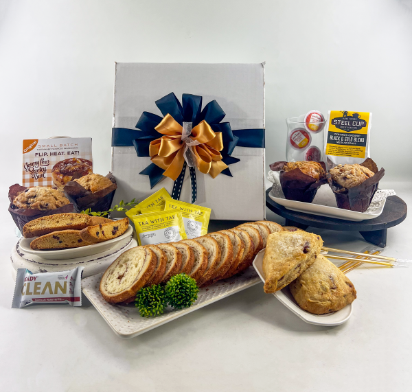 A gift that is presented in a box and is filled with fresh baked goods from the local Pittsburgh bakers. Delicious goodies.